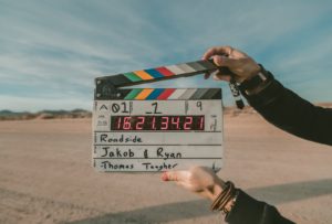 a movie board against a desert background